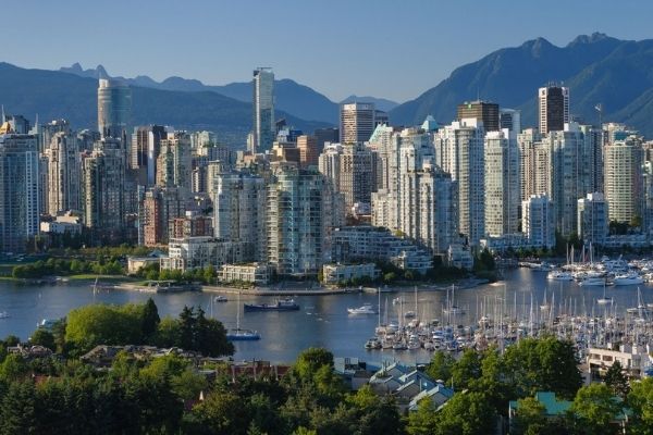 Vancouver cityscape with dondos and mountains in the background
