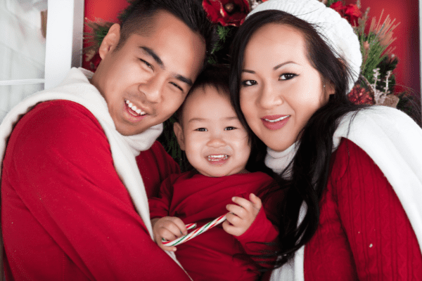 An Asian family photo celebrating Christmas in Canada