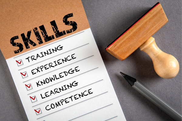 A checkbox listing required skills for a job including training, experience, knowledge, learning, and competence.