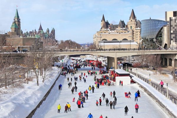 Ice skating on the Rideau Canal in Ottawa. This Canadian city is also Canada's capital city.