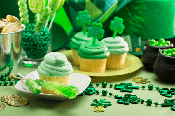 Festive green shamrocks, food, and party favours